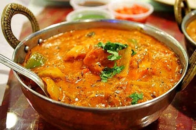 Many curries have very rich sauces and ingredients such as ghee, which boost the calories